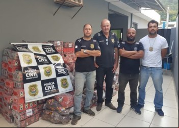 POLÍCIA CIVIL DE NOVA ERA RECUPERA CARGA DE CAFÉ ROUBADA DE CAMINHÃO